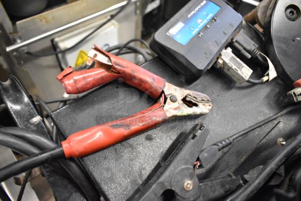 Midtronics GRB Battery and Electrical Diagnostic Station with cables, showing wear. Digital display visible, used condition.