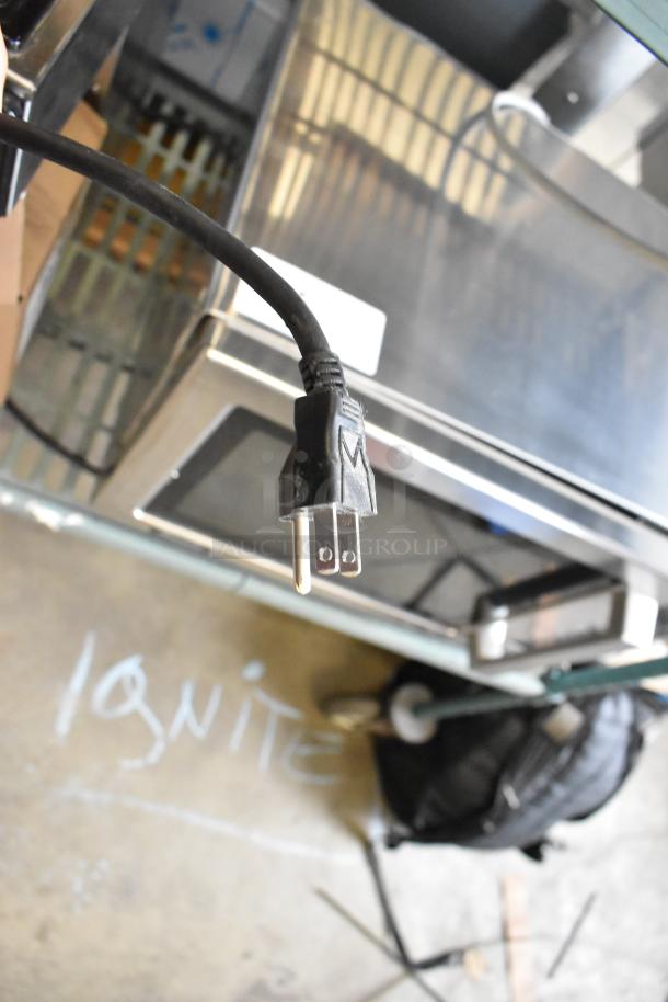 Bunn VP17-2 commercial coffee machine, stainless steel, 2 burners, 120V, brand new with minor scratches, plug visible.