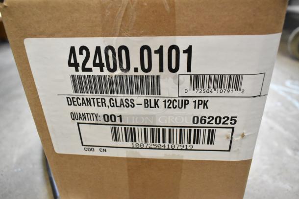 Cardboard box label for a 12-cup glass coffee decanter, quantity 1, with barcodes and item numbers.