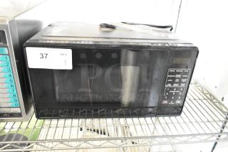 BRAND NEW SCRATCH AND DENT! 2024 Mainstays MS8436127995-01 Countertop Microwave Oven. 120 Volts, 1 Phase. - Item #1222989