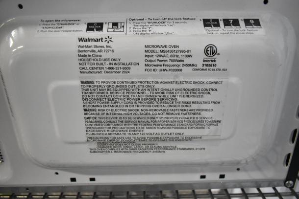 Mainstays MS8436127995-01 microwave label details; 120V, 60Hz, 1100W. Manufactured December 2024, ETL certified, household use.