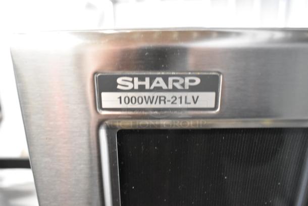Sharp R-21LVF microwave with 1000W power label, stainless steel finish, commercial countertop model, 2024 version.