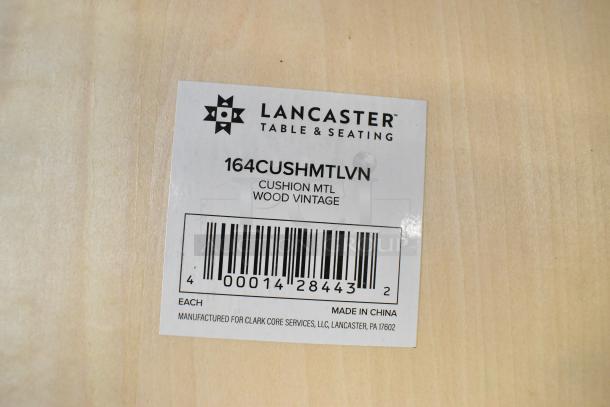 Lancaster Table & Seating label for black cross back bar stool with vintage wood seat, model 164CUSHMTLVN, made in China.