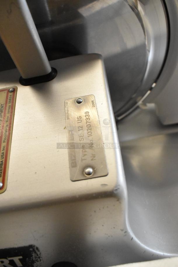 Bizerba metal commercial countertop meat slicer, Model SE 12 US, 115 volts, 1 phase, with visible serial number plate.