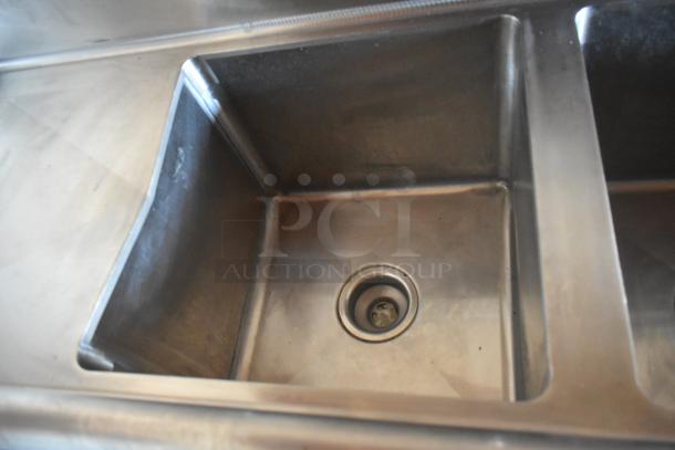 Stainless steel sink inside fully equipped food trailer, showcasing commercial-grade quality. Ideal for mobile kitchen use.
