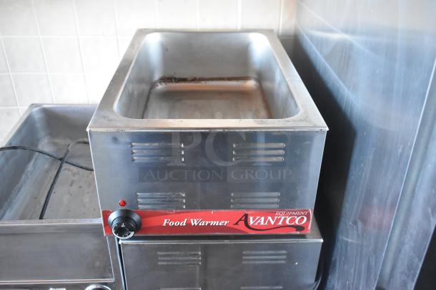 Avantco food warmer in food trailer, stainless steel, adjustable knob, commercial-grade, used condition, clear labeling.
