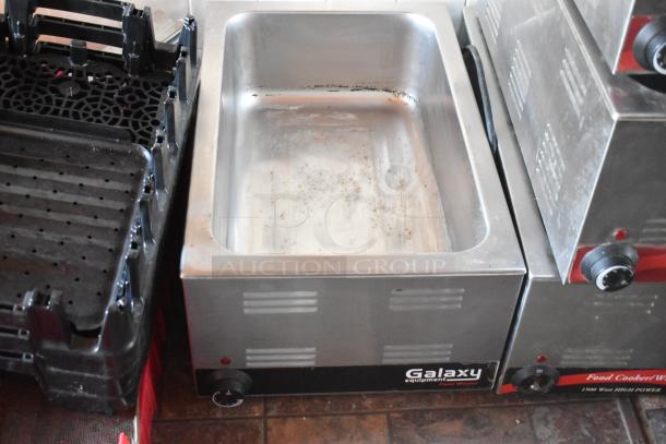 Galaxy food warmer in stainless steel with adjustable temperature control, part of a fully outfitted mobile kitchen.