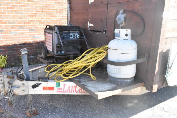 2007 Lanchester food trailer with Honda generator and propane tank. Ready for mobile kitchen use. Clear title included.