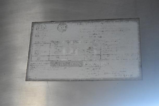 Faded manufacturer's label on the 2007 Lanchester food trailer; includes specifications and certification marks.