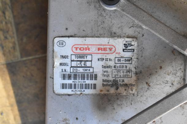 Label on Torrey scales showing model L-PC 40L, capacity 40 lb, temperature range -10°C to 40°C, serial no. D13-13414.