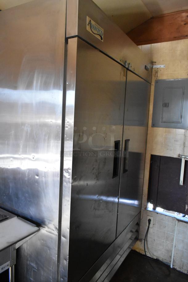 Avantco two-door cooler in 2007 Lanchester food trailer, stainless steel, commercial-grade equipment, clean condition.