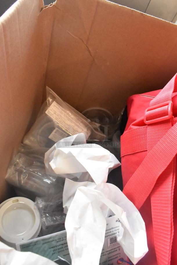 A cardboard box containing various items, including Starbucks ceramic mugs, poly cups, and a red bag. Items appear unused.