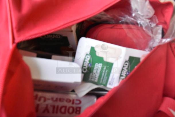 Assorted items in a red bag, including Curad bandages and other health products; specific Starbucks items not visible.
