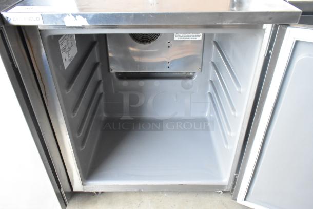 2019 Delfield 406P-STAR2 stainless steel undercounter cooler, open single door view, on commercial casters, 115V, 1 phase.