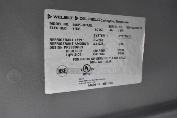 Label of Delfield 406P-STAR2 cooler showing model, electrical specs, refrigerant details, and certifications.