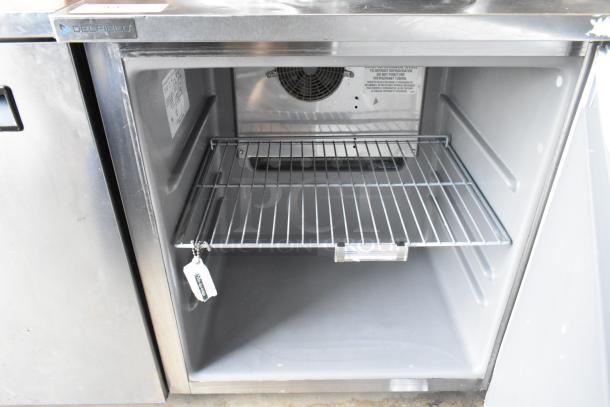 2019 Delfield 406P-STAR2 stainless steel undercounter cooler, commercial casters, single door, 115V, clean interior.