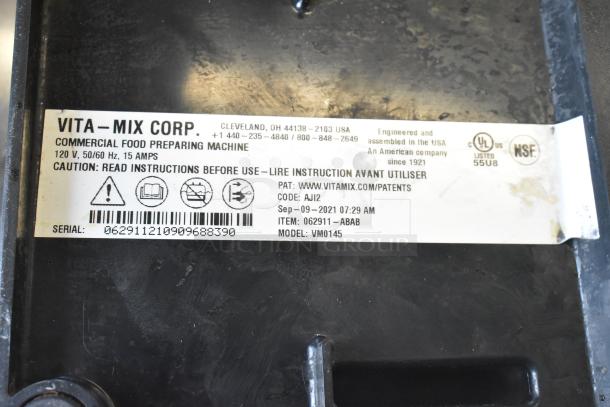 2021 VitaMix VM0145 blender base, metal, 120V, 1 phase, commercial use. Label shows serial number and caution info.