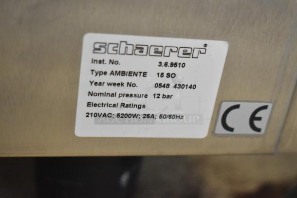 Schaerer Verismo 701 espresso machine, metal, two hoppers, 210VAC, 5200W, 12 bar pressure, CE certified, used condition.