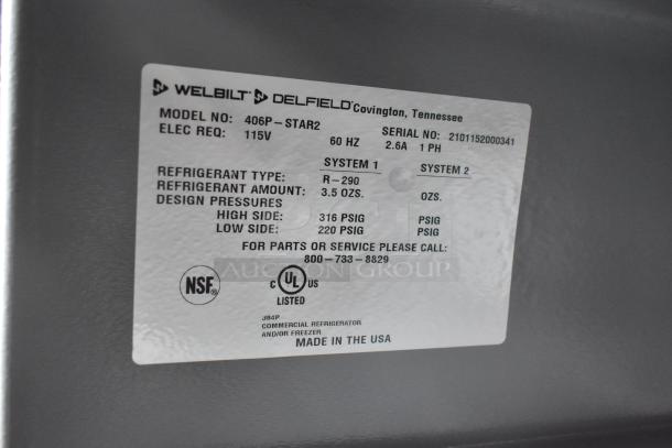 Label on 2021 Delfield 406P-STAR2 undercounter cooler showing model, voltage, refrigerant type, pressures, and certifications.