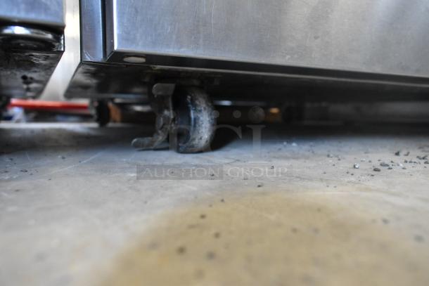 2021 Delfield 406P-STAR2 stainless steel undercounter cooler, focus on commercial caster condition, 115V, single door.