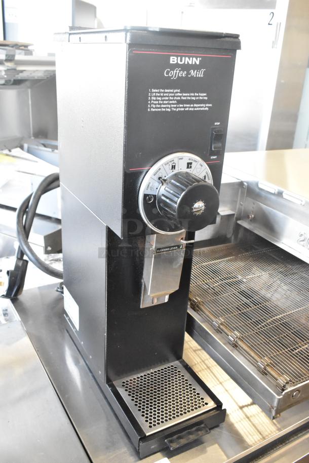2019 Bunn G2 HD metal commercial coffee grinder, 120 volts, 1 phase, sleek black design, excellent condition.