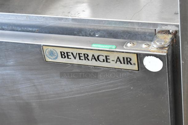 Beverage Air UCR72AY-23 stainless steel 3-door undercounter cooler on casters, visible label, 115V, 1-phase, commercial use.