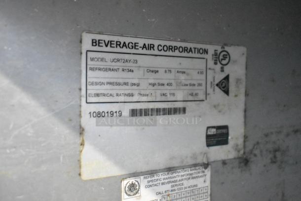 Beverage Air UCR72AY-23 stainless steel 3-door undercounter cooler label showing model, refrigerant, pressure, and voltage.