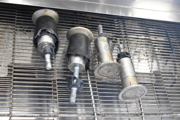Metal components on grill of 2018 Turbochef HhC2020 Conveyor Oven. Stainless steel, electric-powered, three-phase.