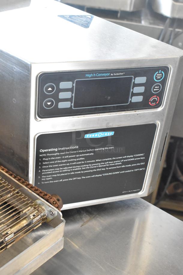 2018 Turbochef HhC2020 stainless steel rapid cook oven, electric, 208/240V, 3 phase. Features control panel and conveyor.