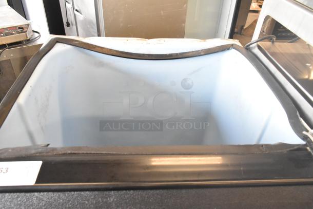 2021 Ice-O-Matic B55PSC stainless steel ice storage bin, 510 lb. capacity, commercial use, signs of wear visible.