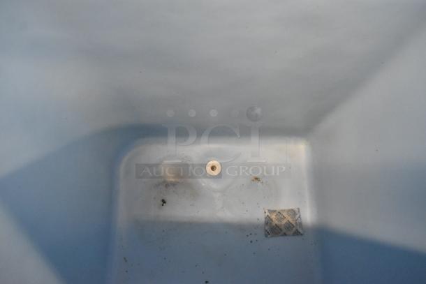 2021 Ice-O-Matic B55PSC stainless steel ice storage bin interior view, showing moderate use with some debris, 510 lb. capacity.