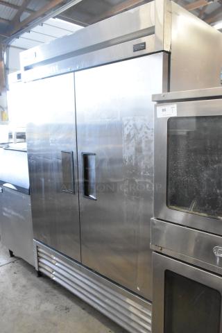 2019 True T-49F-HC stainless steel 2-door reach-in freezer, poly coated racks, commercial casters, 115V, 1 phase.