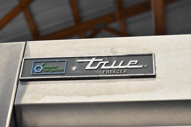 2019 True T-49F-HC, stainless steel 2-door freezer, poly coated racks, commercial casters, natural refrigerant label.