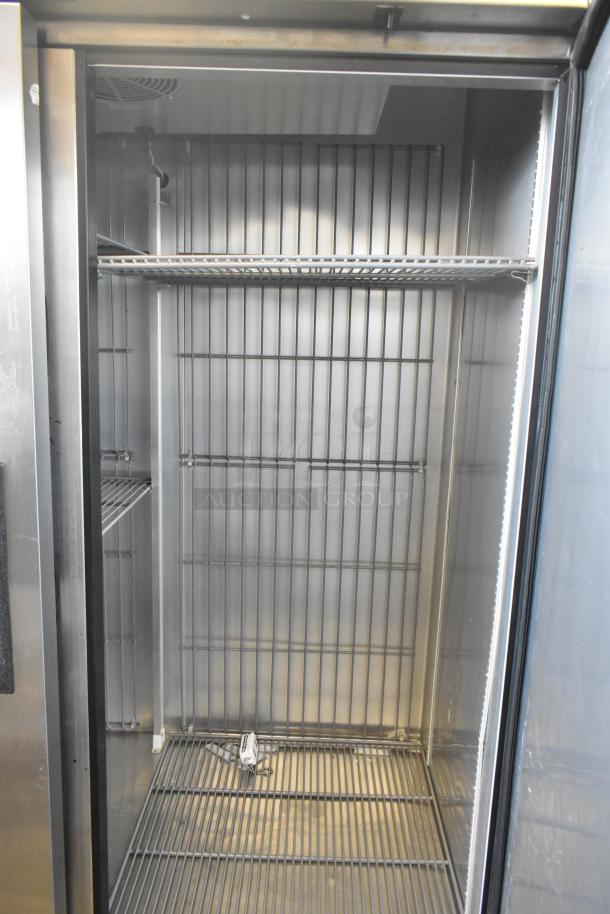 2019 True T-49F-HC stainless steel 2-door commercial freezer, poly-coated racks, commercial casters, 115V, 1 phase.
