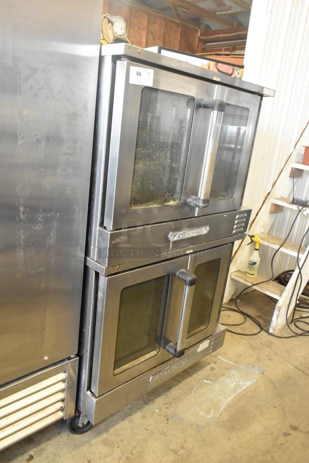 Two Southbend SL Series stainless steel commercial convection ovens with view-through doors, thermostatic controls, on casters.