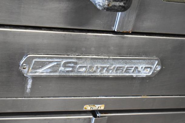 Southbend SL Series stainless steel convection oven, full size, view-through doors, thermostatic controls, on commercial casters.