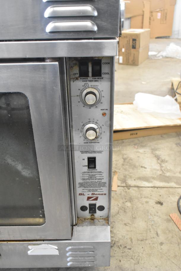 Southbend SL Series stainless steel convection oven, view-through doors, thermostatic controls, on commercial casters.