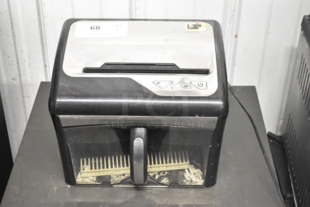 Staples SPL-TXC12MA countertop shredder, 120V, 1 Phase, in used condition. Features control buttons and visible paper bin.