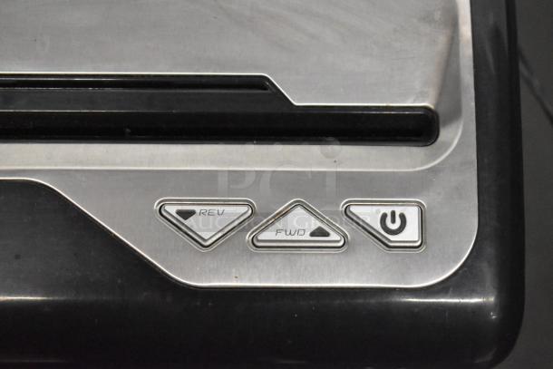 Staples SPL-TXC12MA Countertop Shredder, metal buttons for reverse, forward, and power, 120V, 1 phase.