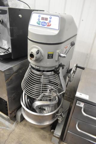 Globe SP40 40-quart commercial dough mixer with stainless bowl, guard, attachments; 208V, 3 phase; in good condition.