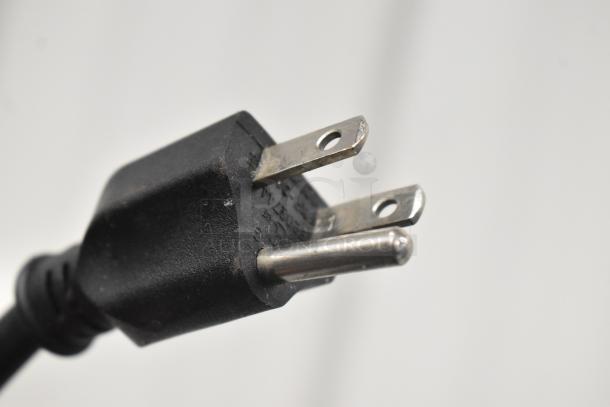 Close-up of a power plug for a Hoshizaki DBF-40SAC countertop kegerator. Standard 115V connector.