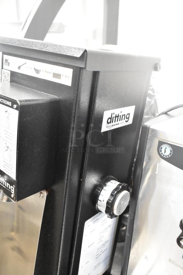 2017 Ditting KR1203 commercial coffee grinder, black metal, with dial control, visible Ditting branding, 120V, 1 Phase.