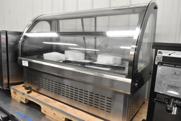 BRAND NEW Vollrath stainless steel commercial countertop display case. Scratch and dent condition, clear curved glass front.