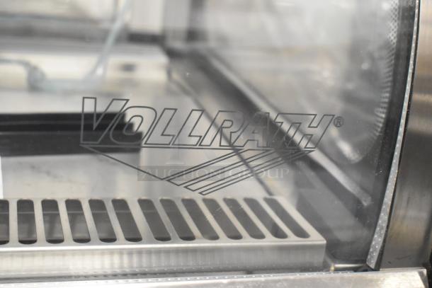 BRAND NEW Vollrath stainless steel display case merchandiser, scratch and dent model. Features logo on glass pane.