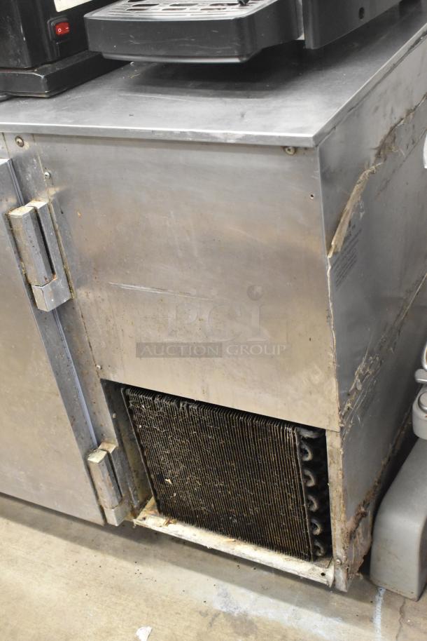 Beverage Air UCRD93A-4-23 stainless steel undercounter cooler, 4 drawers, 1 door, 115V, visible wear, 1 phase.