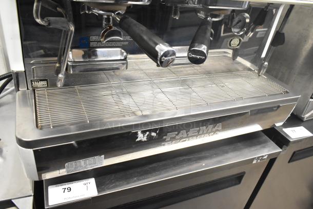 Faema Teorema stainless steel 2 group espresso machine with 3 portafilters, 2 steam wands; commercial countertop model.