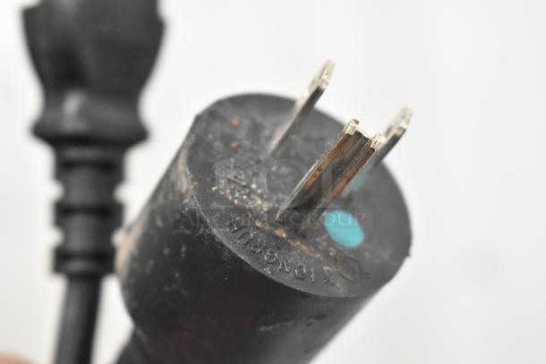 Close-up image of a power plug for the Automatic Bar Controls JT-NITCOM-R Nitro Dispenser, showing prongs and labeling.