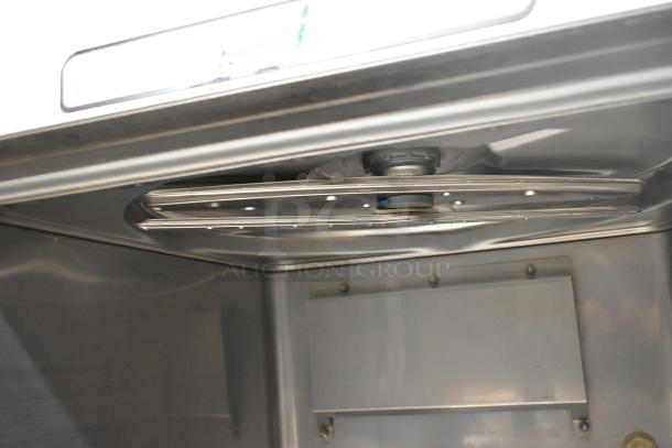 2021 Hobart LXER stainless steel undercounter dishwasher, interior view, showing spray arms and clean condition.