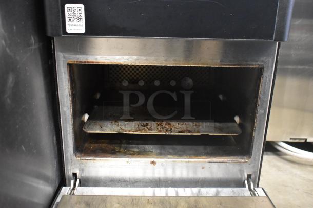 2023 Merrychef eikon e2s metal electric rapid cook oven, 208/240V, 1 phase, used condition, interior stains visible.