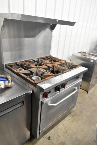 Vulcan SX36 Stainless Steel Commercial Natural Gas Powered 6 Burner Range w/ Oven, Over Shelf and Back Splash. 198,000 BTU. - Item #1223072